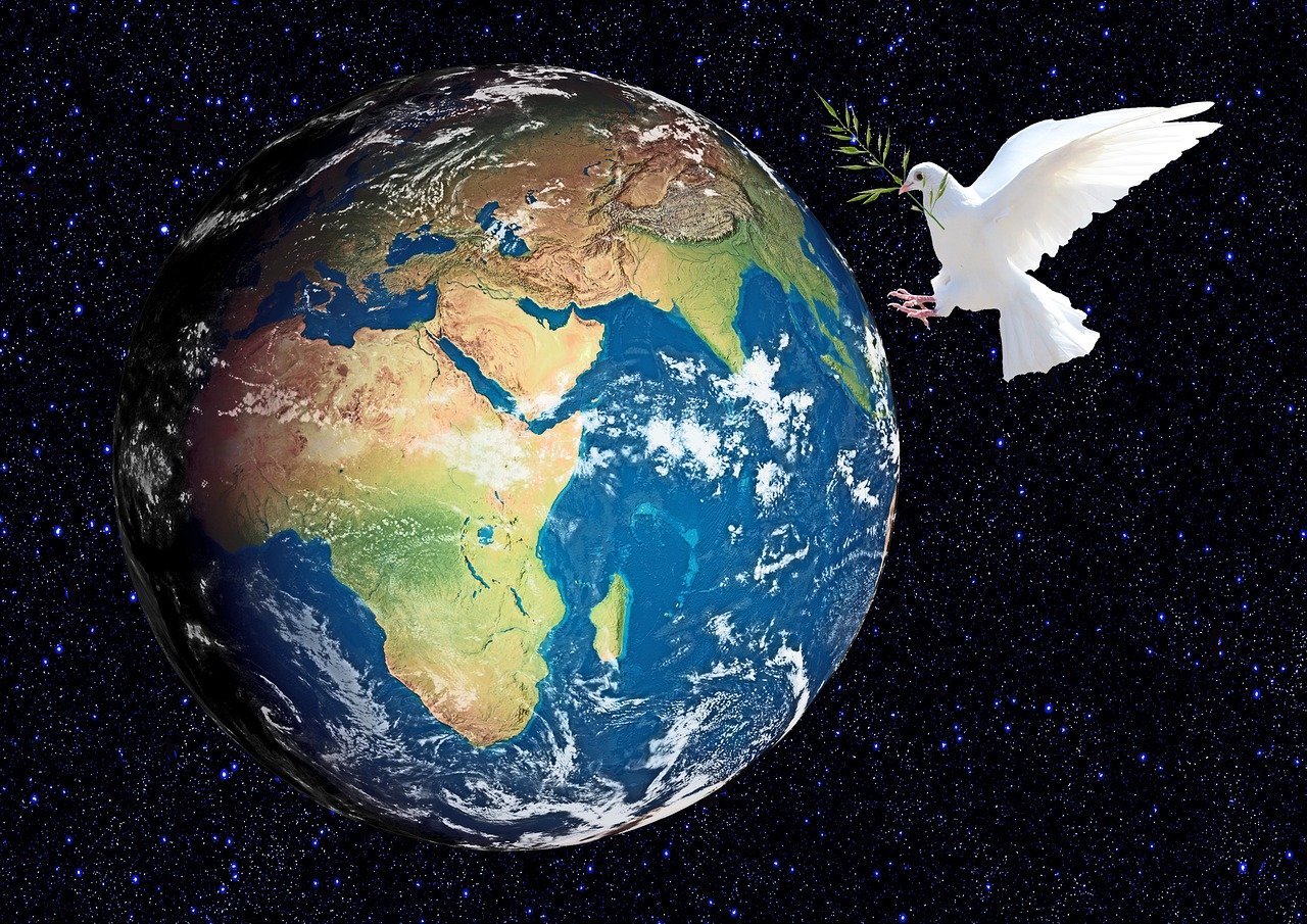 Weltkugel Friedenstaube weiße Taube