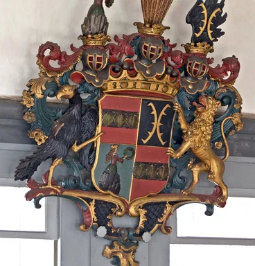 Wappen an der Kirchenwand in St. Johannis Siebeneichen