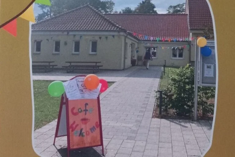 Eingang zum Café welcome